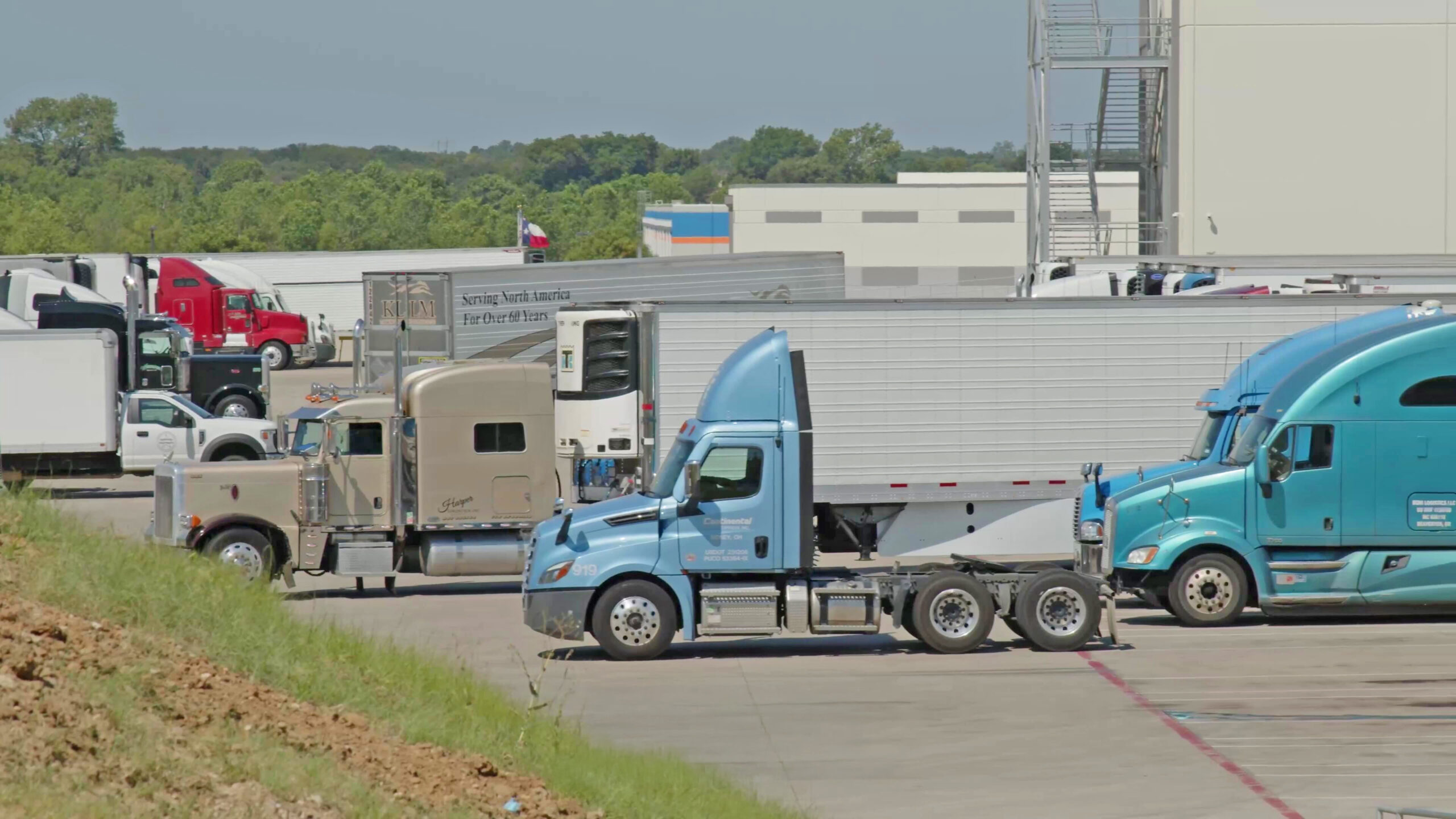 Trucks waiting to dock at CORE X PREMIER