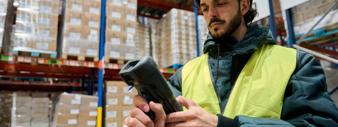man in cold storage scanning items