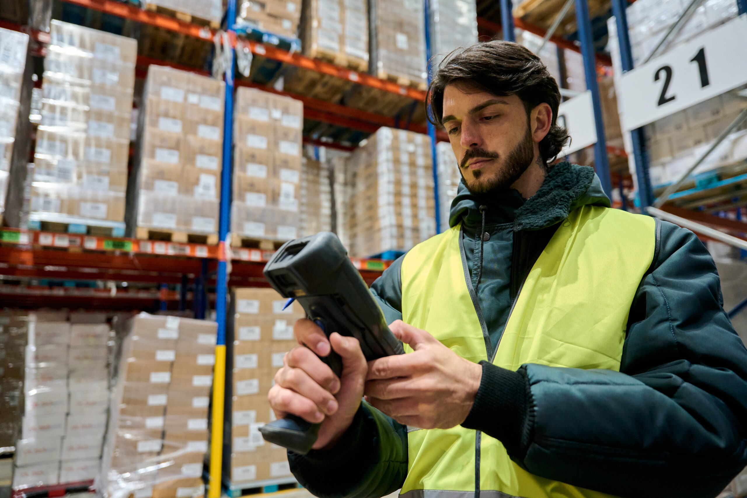 man in cold storage scanning items